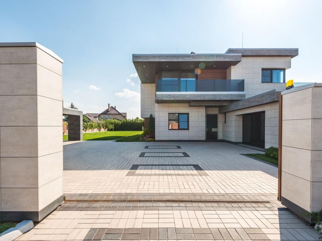 Modern villa with cream panel cladding