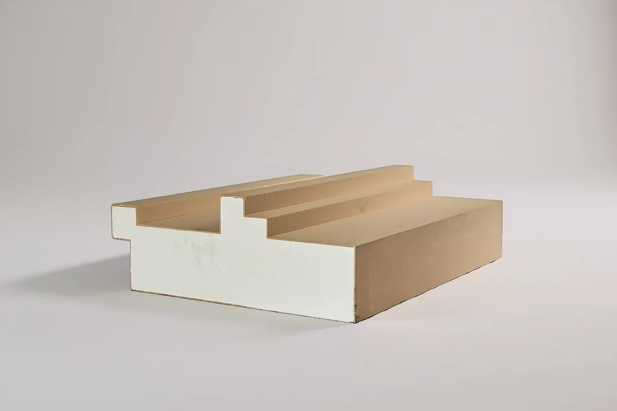 The white acrylic shell layer over the EPS core on a CLADECO® profile